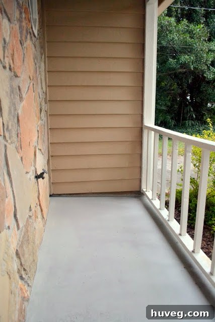 The final image of the painted stoop, showing a wider view of the entrance and hinting at future decorating possibilities.